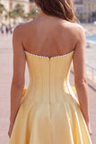 Peach Pink Satin Strapless Corset A-Line Pearls Homecoming Dress with Bow