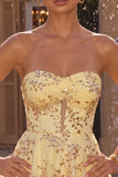 Yellow A-Line Strapless Cut Out Sequins Homecoming Dress
