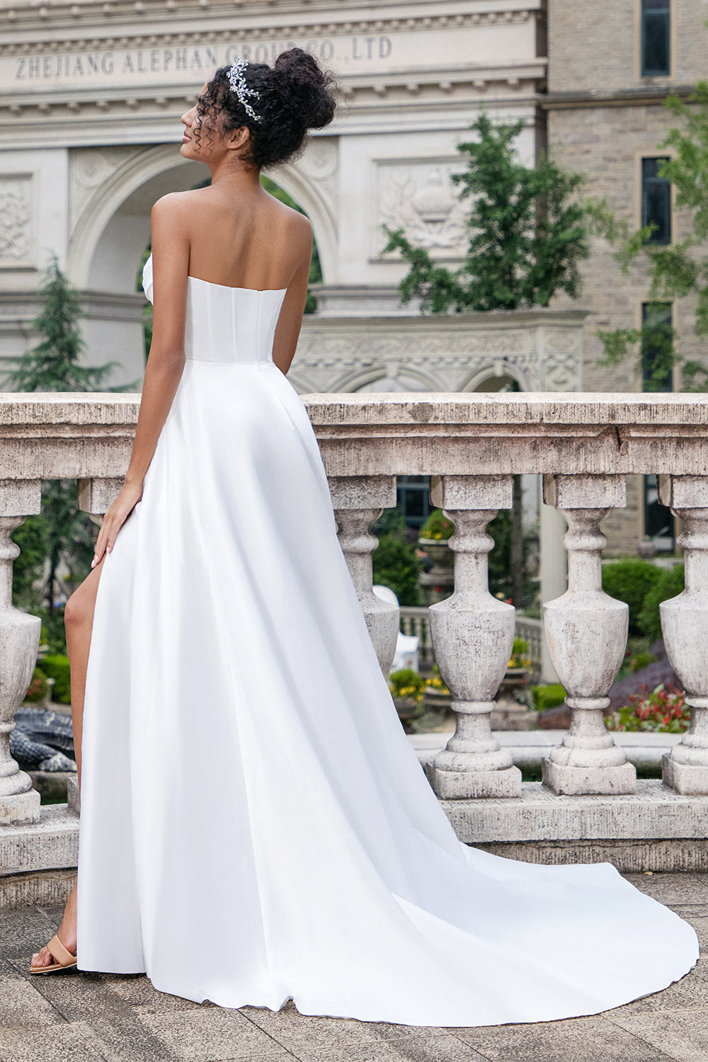 white dress train Zapaka Women Elegant Wedding With Slit A Line Strapless Pleated Sweep Bridal Dress, White / US4 making it perfect for brides who want a sleek alternative to traditional dresses The History of the Wedding